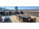 Relaxing rooftop deck with city views and seating area at 353 E Bonneville Ave # 385, Las Vegas, NV 89101