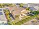 House with tile roof, covered patio, and grassy backyard, viewed from above at 37 Stonemark Dr, Henderson, NV 89052