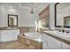 Primary bathroom with a soaking tub and double vanity at 37 Stonemark Dr, Henderson, NV 89052