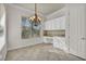 Bright breakfast nook with chandelier and built-in cabinetry at 37 Stonemark Dr, Henderson, NV 89052