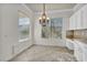 Breakfast nook with chandelier and window views at 37 Stonemark Dr, Henderson, NV 89052