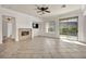 Spacious living room with fireplace and tiled floors at 37 Stonemark Dr, Henderson, NV 89052