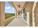 Covered patio with ceiling fans offers access to the backyard at 37 Stonemark Dr, Henderson, NV 89052