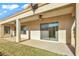 Covered patio with ceiling fans and sliding glass doors at 37 Stonemark Dr, Henderson, NV 89052