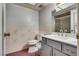 Bathroom with single vanity, toilet, and shower/tub combo at 3767 Monument St, Las Vegas, NV 89121