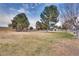 Open green space with mature trees and playground at 3767 Monument St, Las Vegas, NV 89121