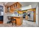 Bright kitchen with stainless steel appliances and wood cabinets at 3767 Monument St, Las Vegas, NV 89121