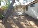 Large backyard with dirt and tree at 384 Norlina Ct, Henderson, NV 89014