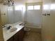 Clean bathroom with tub, toilet and vanity at 384 Norlina Ct, Henderson, NV 89014