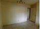 Empty bedroom with tile floors and a window at 384 Norlina Ct, Henderson, NV 89014