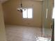 Dining room with tile floor and a chandelier at 384 Norlina Ct, Henderson, NV 89014