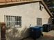 Home's side view, showing windows and trash bins at 384 Norlina Ct, Henderson, NV 89014