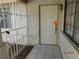 Front entry with tiled flooring and security gate at 384 Norlina Ct, Henderson, NV 89014