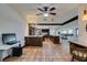 Spacious kitchen with island, stainless steel appliances, and granite countertops at 3990 Melody Ln, Las Vegas, NV 89108