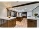 Gourmet kitchen with granite island and high-end stainless steel appliances at 3990 Melody Ln, Las Vegas, NV 89108