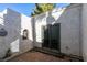 View of private patio and sliding glass door at 3990 Melody Ln, Las Vegas, NV 89108