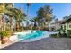 Inviting kidney shaped pool in the backyard at 3990 Melody Ln, Las Vegas, NV 89108