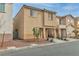 Two-story house with attached garage, landscaping, and driveway at 4070 Emerald Wood St, Las Vegas, NV 89115