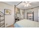 Bright bedroom with a ceiling fan and built-in shelving at 4089 Patterson Ave, Las Vegas, NV 89104