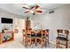 Charming dining area with wooden table and chairs, and access to other rooms at 4089 Patterson Ave, Las Vegas, NV 89104