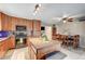 Bright kitchen with oak cabinets, granite island, and stainless steel appliances at 4089 Patterson Ave, Las Vegas, NV 89104