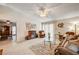 Bright living room with a fireplace, comfortable seating, and tile floors at 4089 Patterson Ave, Las Vegas, NV 89104