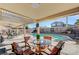 Covered patio furniture overlooking a refreshing pool at 4089 Patterson Ave, Las Vegas, NV 89104