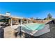 Inviting backyard oasis with a sparkling pool and patio at 4089 Patterson Ave, Las Vegas, NV 89104