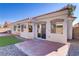 Backyard with patio, grass, and gravel at 4176 Demoline Cir, Las Vegas, NV 89141