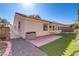 Spacious backyard with patio and grassy area at 4176 Demoline Cir, Las Vegas, NV 89141