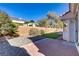 Artificial turf backyard with patio and rock landscape at 4176 Demoline Cir, Las Vegas, NV 89141