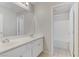 Clean bathroom with double vanity and shower/tub combo at 4176 Demoline Cir, Las Vegas, NV 89141