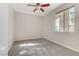 Bright bedroom with ceiling fan and carpet flooring at 4176 Demoline Cir, Las Vegas, NV 89141