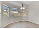 Bright dining area with tile floor and large windows at 4176 Demoline Cir, Las Vegas, NV 89141