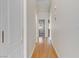 Light and airy hallway with wood-look floors at 4176 Demoline Cir, Las Vegas, NV 89141