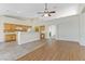 Kitchen with light wood cabinets, tile floors and breakfast bar at 4176 Demoline Cir, Las Vegas, NV 89141