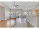 Bright living room with hardwood floors and sliding glass door to backyard at 4176 Demoline Cir, Las Vegas, NV 89141