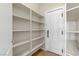 Walk-in pantry with adjustable shelving at 4176 Demoline Cir, Las Vegas, NV 89141