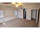 Bright bedroom featuring carpet and ceiling fan at 4290 S Gressa St, Pahrump, NV 89061