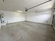 Spacious two-car garage with ample storage space and water heater at 4290 S Gressa St, Pahrump, NV 89061