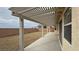 Covered patio with pergola and gravel backyard at 4290 S Gressa St, Pahrump, NV 89061