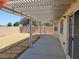 Covered patio with gravel yard and pergola at 4290 S Gressa St, Pahrump, NV 89061