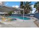 Inviting kidney-shaped pool with spa and patio cover at 4330 Flandes St, Las Vegas, NV 89121