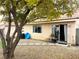 Landscaped backyard with gravel, trees, and a patio area at 4618 Zia Ridge St, North Las Vegas, NV 89031