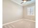 Bright bedroom with ceiling fan and plantation shutters at 473 Harvest Rain Ave, Henderson, NV 89011