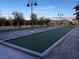 Well-maintained bocce ball court with surrounding landscaping at 473 Harvest Rain Ave, Henderson, NV 89011