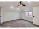 Bedroom with vaulted ceiling, carpet, and ceiling fan at 5129 Del Monte Ave, Las Vegas, NV 89146