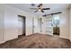 Bright bedroom featuring a barn door and carpet flooring at 5129 Del Monte Ave, Las Vegas, NV 89146