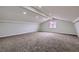 Bright bonus room with carpeted floor and sloped ceiling at 5129 Del Monte Ave, Las Vegas, NV 89146