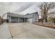 House exterior with a covered entryway and attached garage at 5129 Del Monte Ave, Las Vegas, NV 89146